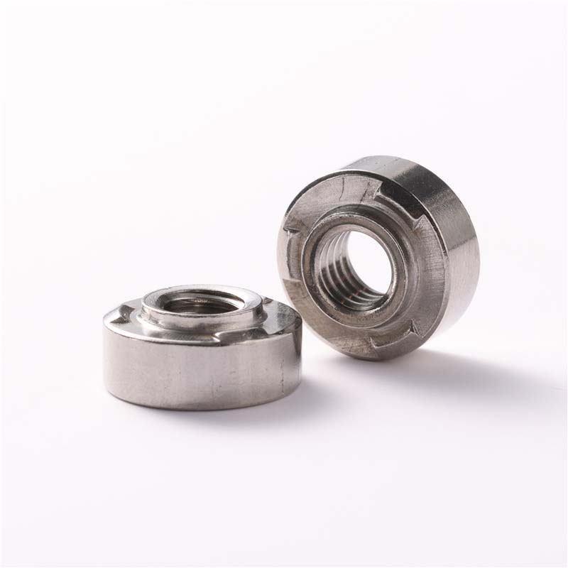 Self -closching projection weld nut
